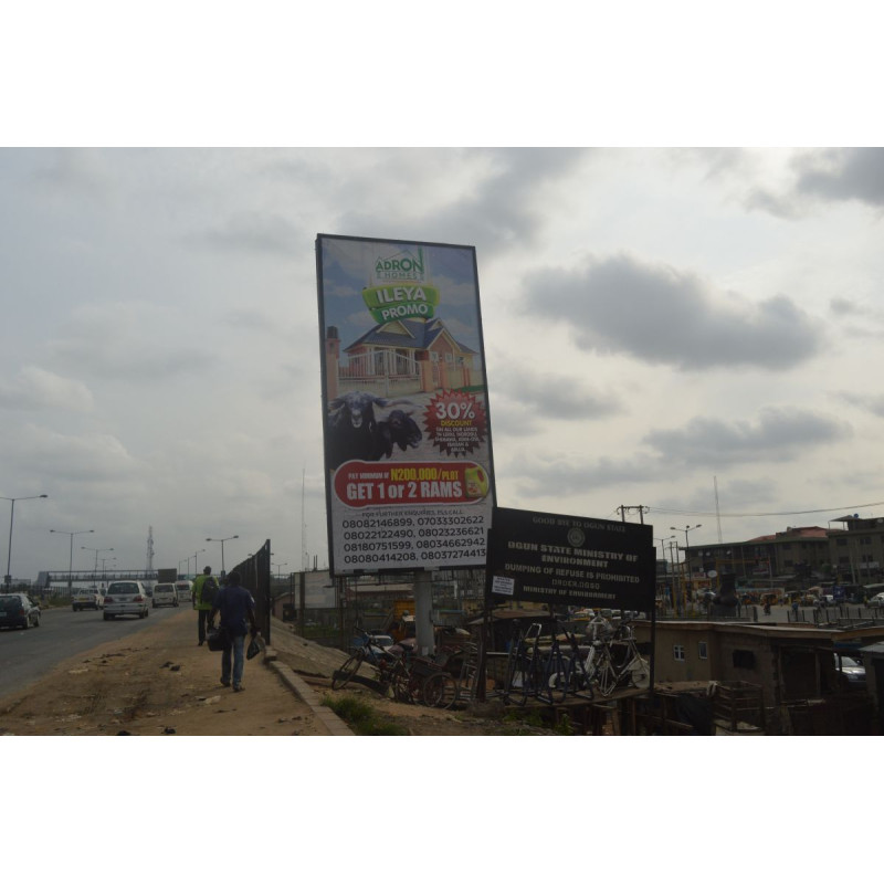 Portrait Billboard At Berger Bus Stop Lagos Ibadan Expressway